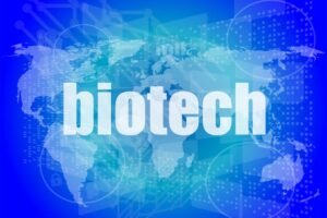 Biotech over blue world map with hi-tech theme