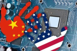 Colors of Chinese US Flags in Shapes of Hands over Graphics Card