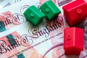 Bank of England Note with Plastic House Models