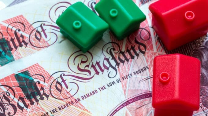 Bank of England Note with Plastic House Models